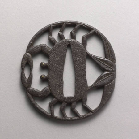 Openwork tsuba with design of crab and leaves