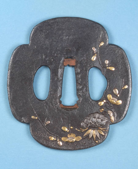 Tsuba with design of Plum tree (raised rim)