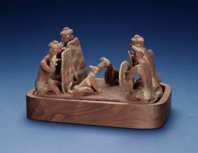 Group with human figures and dogs