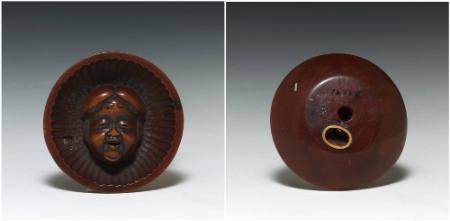 Netsuke with design of a Noh mask of Okame