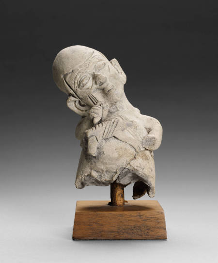 Figure of Old Woman Carrying Two Children