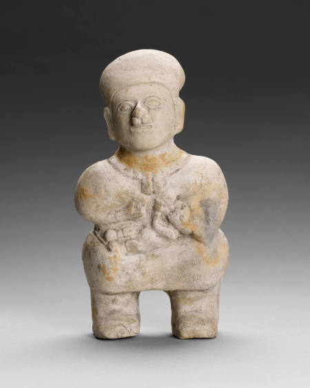 Figure Of Mother Nursing Child