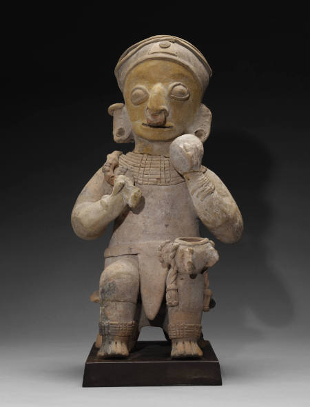 Seated Male Figure with Bowls
