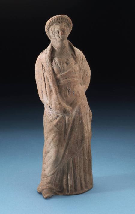 Standing female figure in chiton and himation