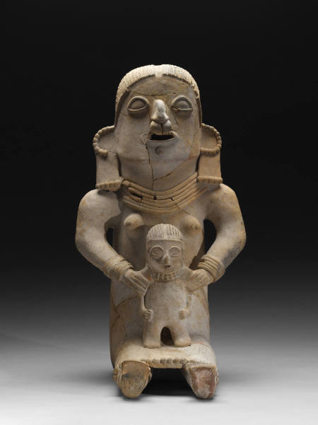 Seated figure of mother holding child