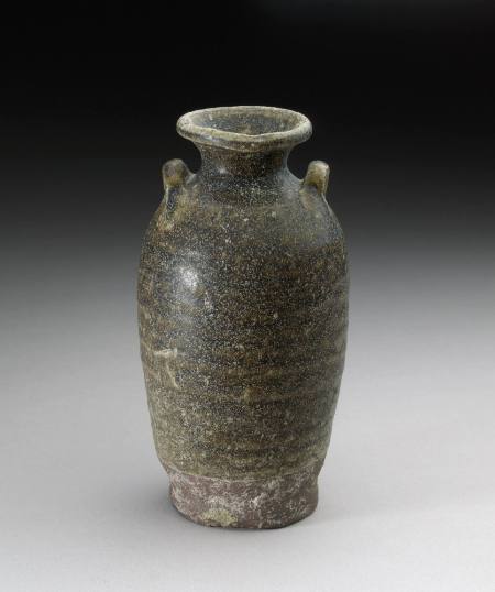 Small, slender bottle vase