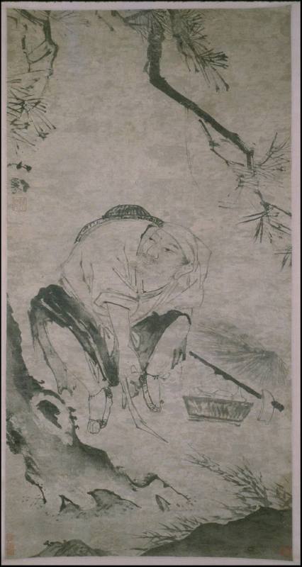 Woodcutter tying his sandal