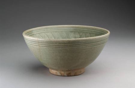 Deep conical bowl decorated inside with incised diamond pattern