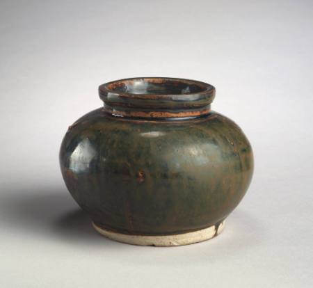 Jar of globular form with streaked blue-black and brown glaze