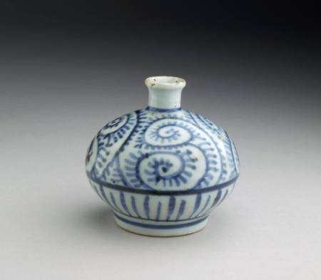 Bottle with spiral designs