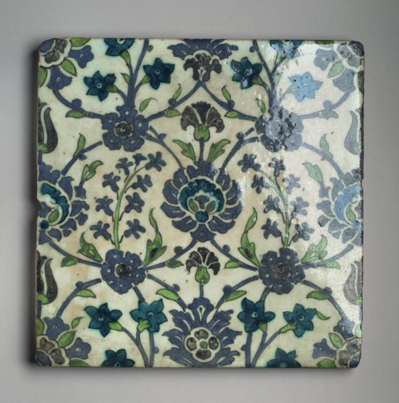 Large square tile with floral motifs