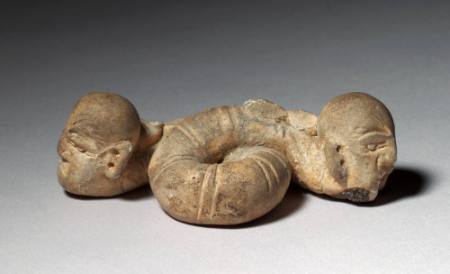 Two-headed serpent with men's heads