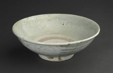 Deep bowl with scrolling motifs alternating with linear motifs