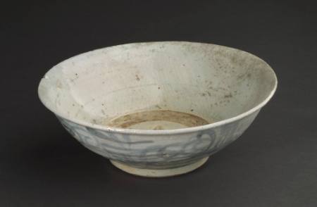 Deep bowl with scrolling motifs alternating with linear motifs