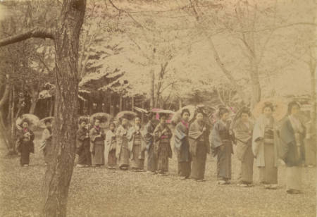 [Women walking in a line]