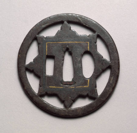 Tsuba with pierced design of 6-pointed star, inlaid with squares and scrolls
