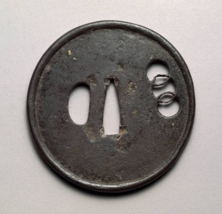 Tsuba with rolled rim and pierced design of three interlocking circles