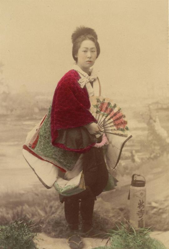 [Dancer in men's costume]