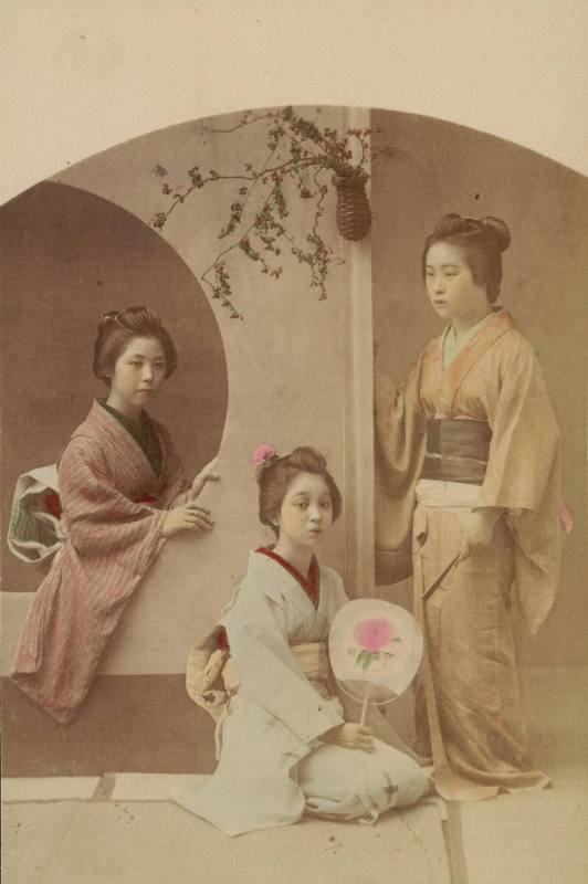 [Three girls posed]