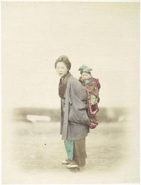 [Woman with baby on back]