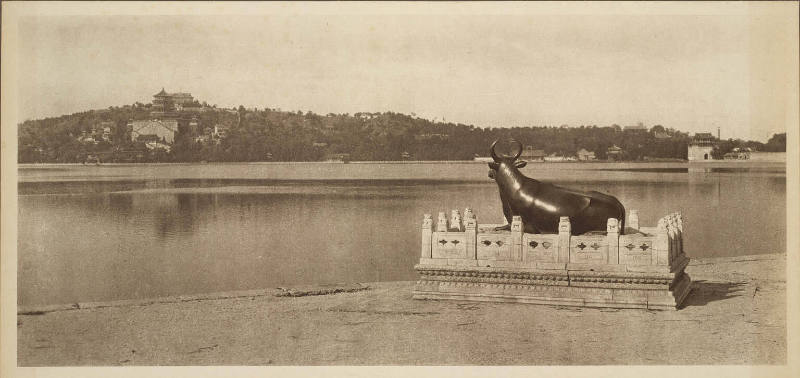 [Bull statue on beach]