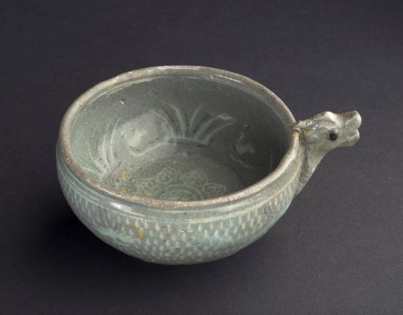 Small cup with dragon's head handle