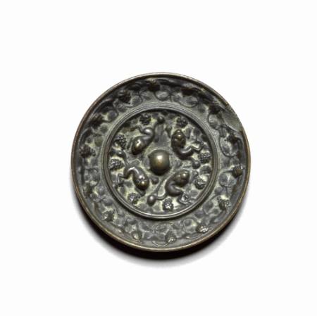 Mirror with lions and grapes design