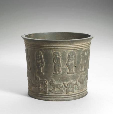 Cylindrical vessel with zodiac design in relief