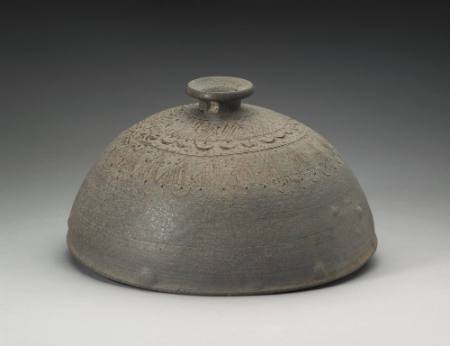 Vessel cover incised with triangle design