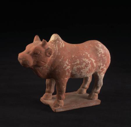 Standing bullock with traces of slip and white pigment