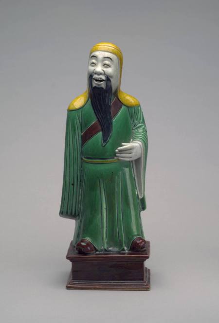 Standing figure of a scholar with biscuit face and hands
