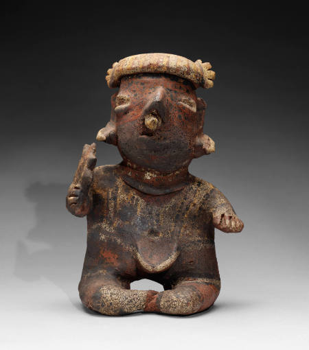 Seated Warrior Figure Holding Star