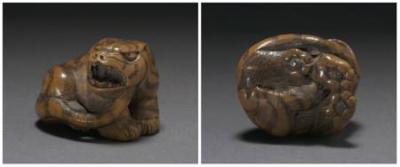 Netsuke of a coiled tiger baring his teeth