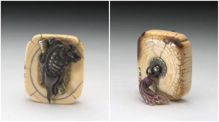 Netsuke of a tortoise and scroll