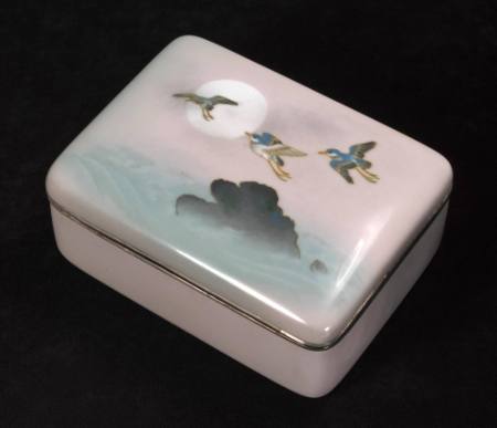 Box with a design of plovers, waves, and moon