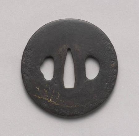 Tsuba with gold inlay