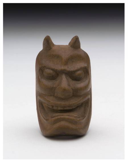 Netsuke in the form of a Noh Hannya mask
