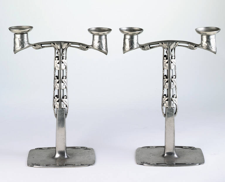 Pair of candlesticks with double candle cups