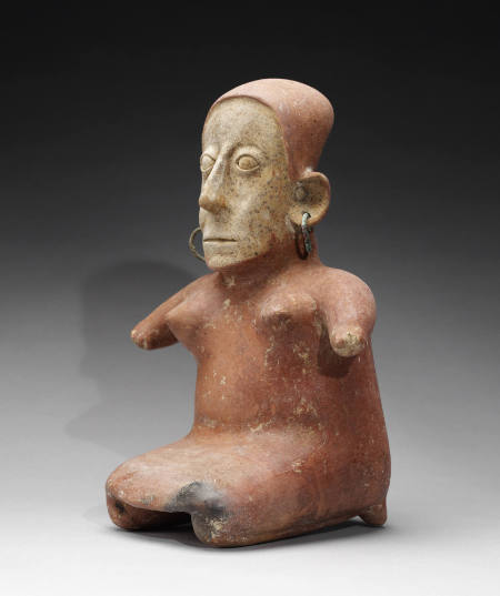 Female Figure with Copper Earrings