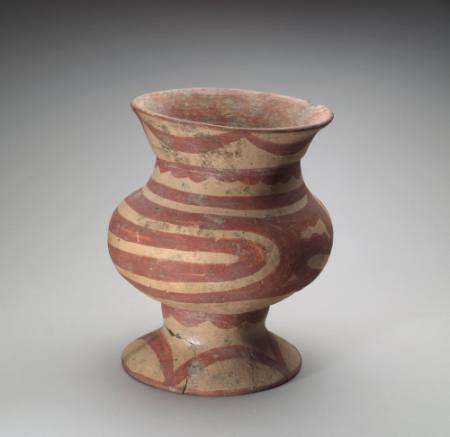 Pot with red geometric designs