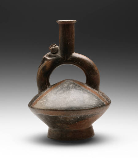 Stirrup-spout bottle with monkey