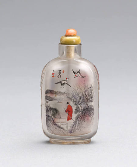 Snuff bottle depicting a figure and cranes in a landscape, and children playing