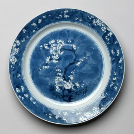 Plate with design of plum and bamboo