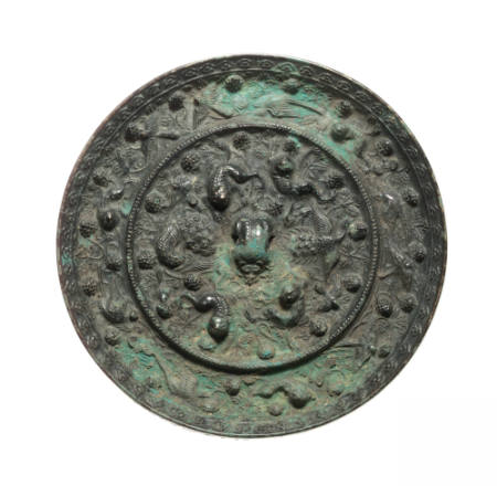 Mirror decorated with lions, doves, cranes and grape clusters