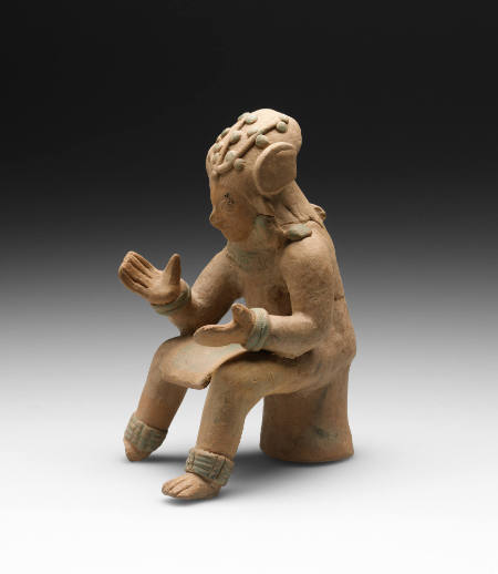 Gesturing female figure