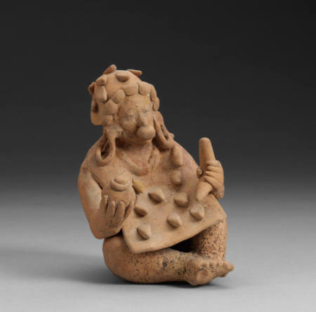Seated figure