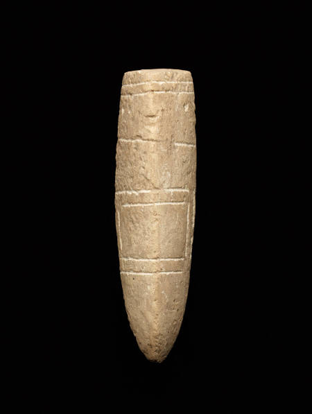 Tusk-shaped amulet