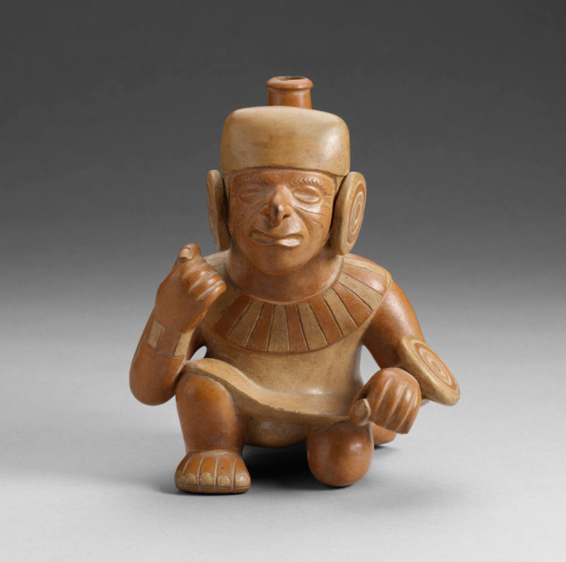 Kneeling warrior effigy vessel