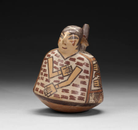 Bridge-spouted polychrome vessel
