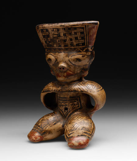 Seated male figure